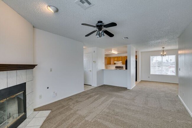 Building Photo - Charming Second-Floor Condo with Two Bedrooms and Fireplace