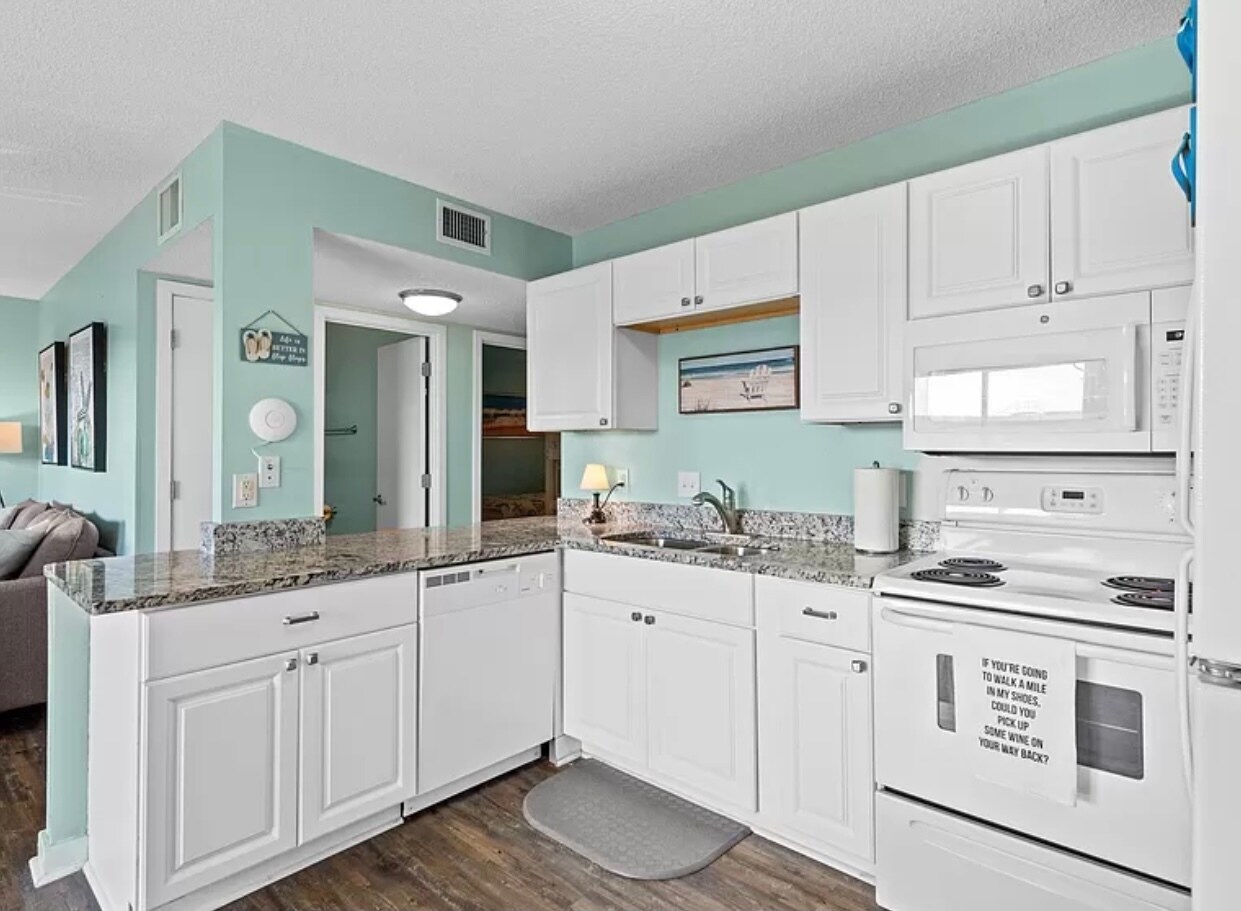 Kitchen has open design with counter space to prep dinner while engaging with family. - 5905 S Kings Hwy