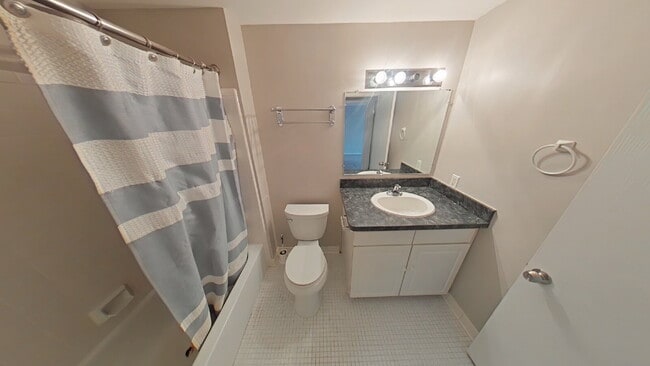 Building Photo - "2-Bed Condo Retreat in Clinton Township – Cozy Comfort Awaits!"