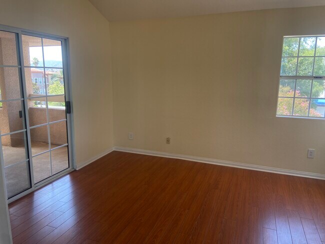 Second bedroom/family room with vaulted ceiling, private balcony with beautiful views. - 435 E Valencia Ave
