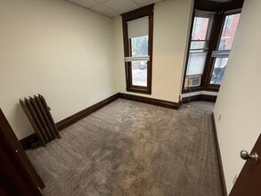 Building Photo - Spacious 4-Bedroom Apartment with Main Street Views