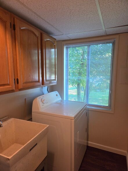 Additional cabinets in the laundry room for extra storage. - 102 Stonecrest