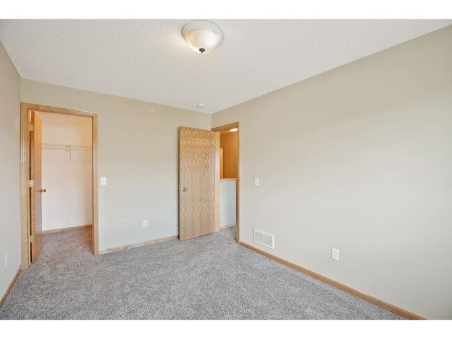 Secondary bedroom. - 4800 Underwood Ln N