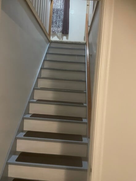 Stairway to upper living area - 1824 N 21st St