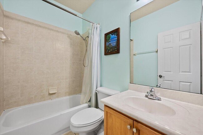 Building Photo - 335 E Thatch Palm Cir