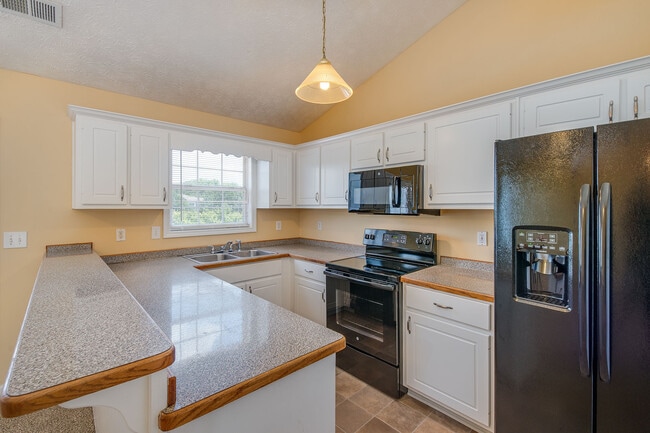 Building Photo - Coing Soon 2/25/26) Impressive 4 Bed, 3 Bath with Home Office!