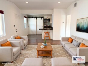 Building Photo - Beautifully Maintained 4-Bedroom Home with Private Backyard