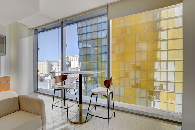 Building Photo - Stunning Strip Views from this Fully Furnished Studio Residence.