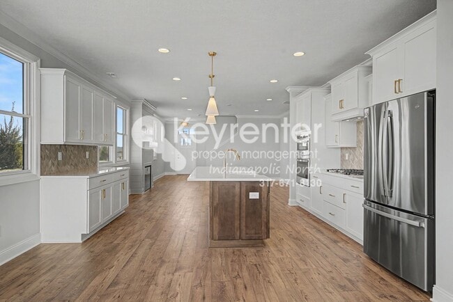 Building Photo - Welcome to this beautiful 3-bedroom, 2.5-bathroom home located in the desirable Westfield, IN