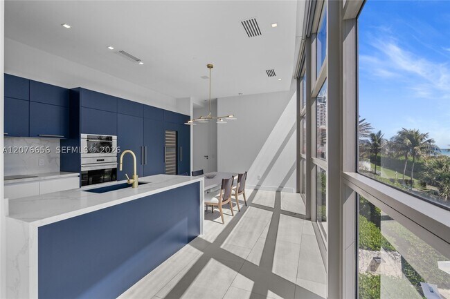 Building Photo - 5875 Collins Ave