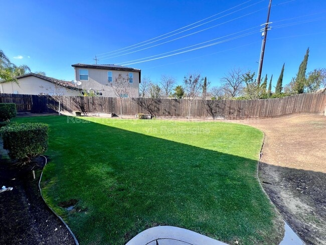 Building Photo - 5597 E Edna Ave