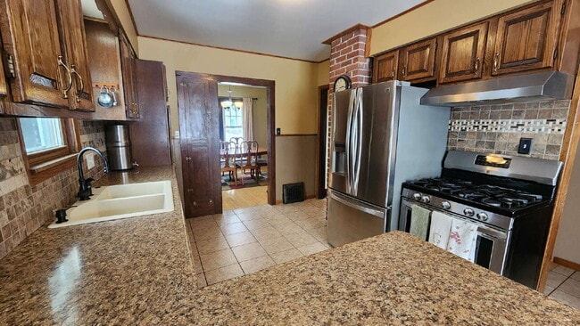 Building Photo - 4-Bedroom, 2 Bathroom Easthill Home with Bonus Room, Finished Lower Level, and Garage