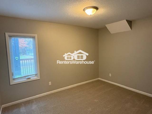 Building Photo - 8191 E River Rd