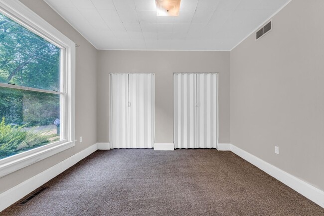 Building Photo - Charming Home with Updates and Covered Por...