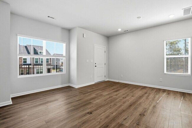Building Photo - BRAND NEW TOWNHOME-9 FOOT CEILINGS-TWO CAR GARAGE-POOL COMMUNITY