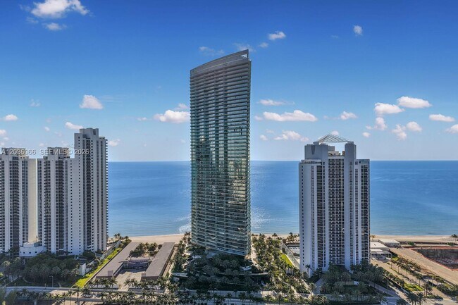 Building Photo - 18975 Collins Ave