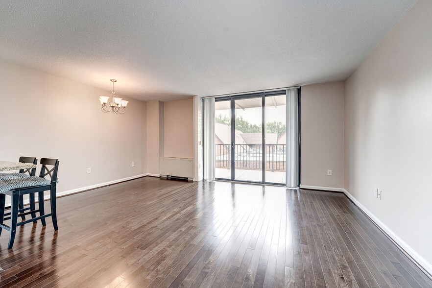 Living & Dining Rooms plus Kitchen have lots of light! - 4242 East West Hwy