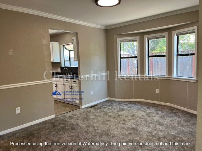 Building Photo - Move in special! Charming, updated home in...