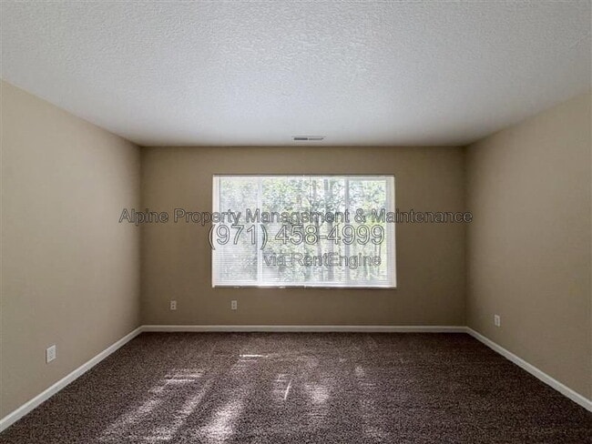 Building Photo - 5758 NE Damsel Dr
