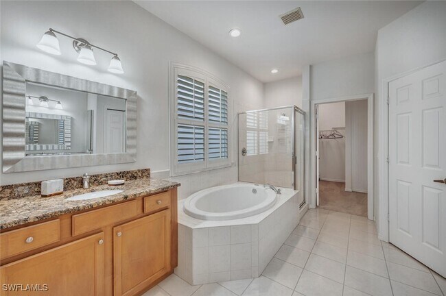 Building Photo - 5583 Lago Villaggio Way