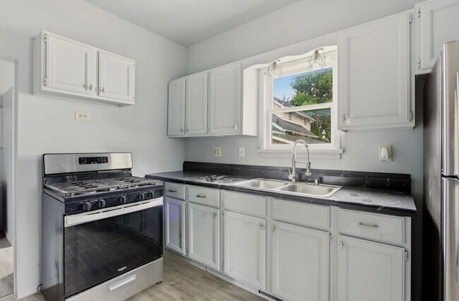 Building Photo - Updated 3BR Home – Renovated Kitchen & Detached Garage