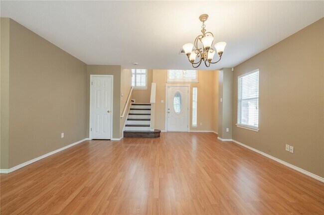 Building Photo - No Carpet! Tons of Space! Beautiful backya...