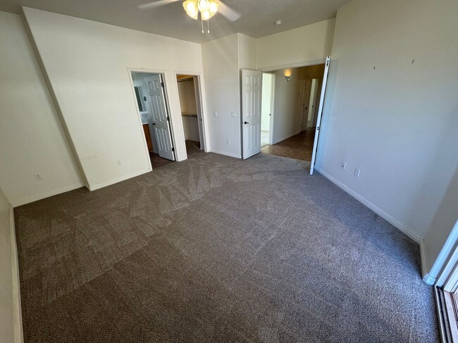 Building Photo - Coral Canyon Gem with NEW CARPET & TWO CAR...