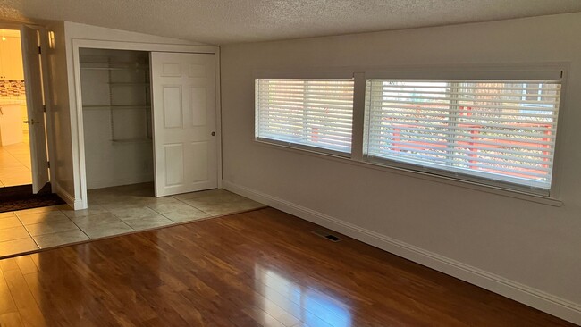 Building Photo - Long term rental with garage and large bac...