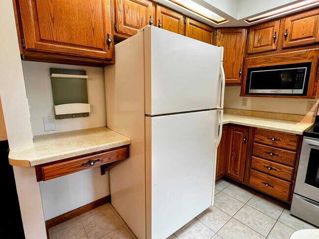 Thoughtful touches, such as a place to hang your keys, are found throughout the home. - 228 W Lexington Blvd