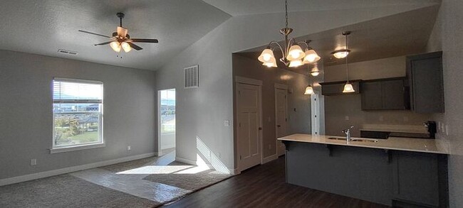 Building Photo - LIKE NEW TOP FLOOR HERRIMAN CONDO - AVAILA...