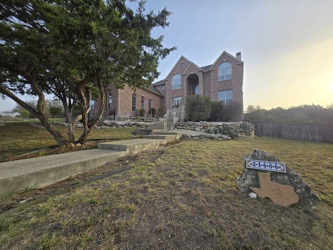 Building Photo - *COMING SOON* Luxurious 2-Story Home in Gated Stone Oak Community – Pool & Lawn Care Included