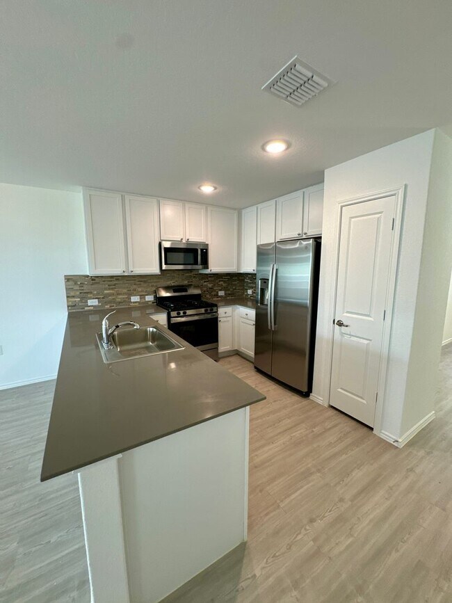 Building Photo - VIDA SUBDIVISION / San Antonio A&M steps away- spacious 4-bedroom, 2-bathroom house