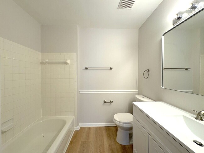 Building Photo - Inviting Suburban Retreat with Spacious Layout and Timeless Hardwood Flooring