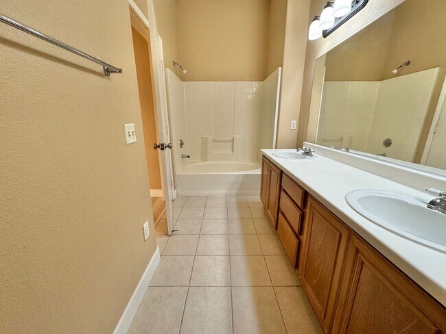 Building Photo - Welcoming 2 Bedroom home with private balcony located in South Las Vegas Community