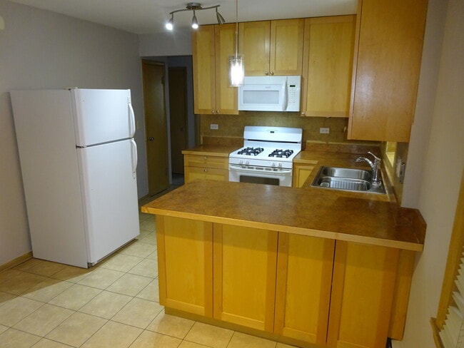 Building Photo - 6636 N Harlem Ave