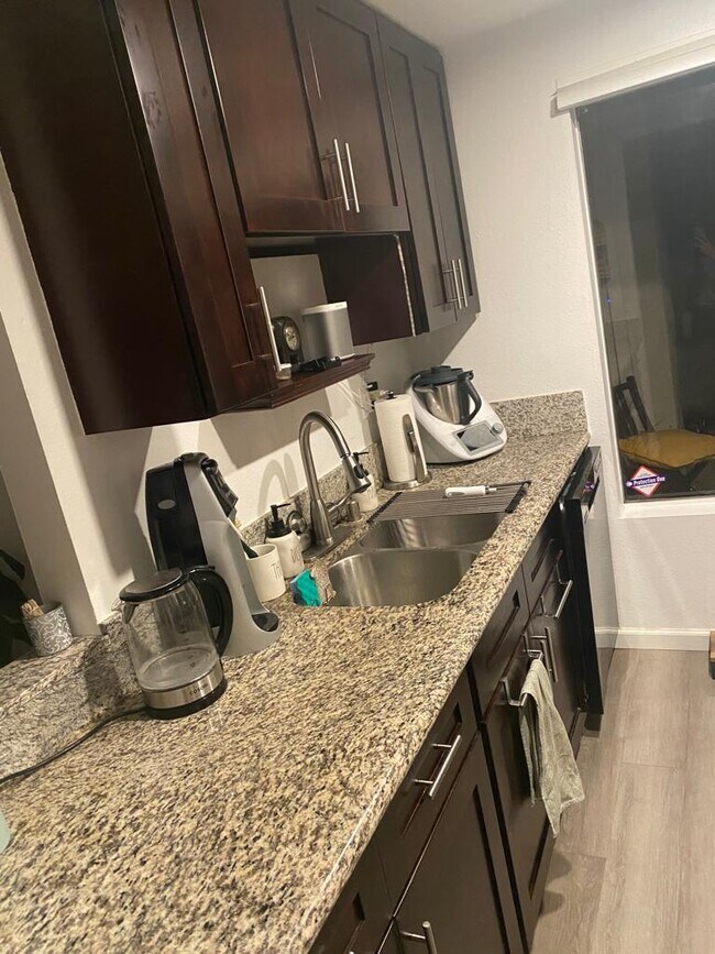 Kitchen with dishwasher and modern appliances - 3106 Summertime Ln