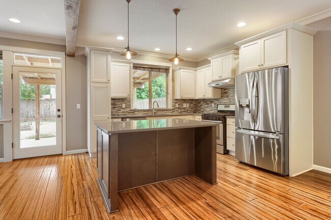 Building Photo - Custom-Built 4BR/2.5BA Two-Story Near Woodstock — Quartz Island Kitchen, Gas Fireplace & Fenced Y...