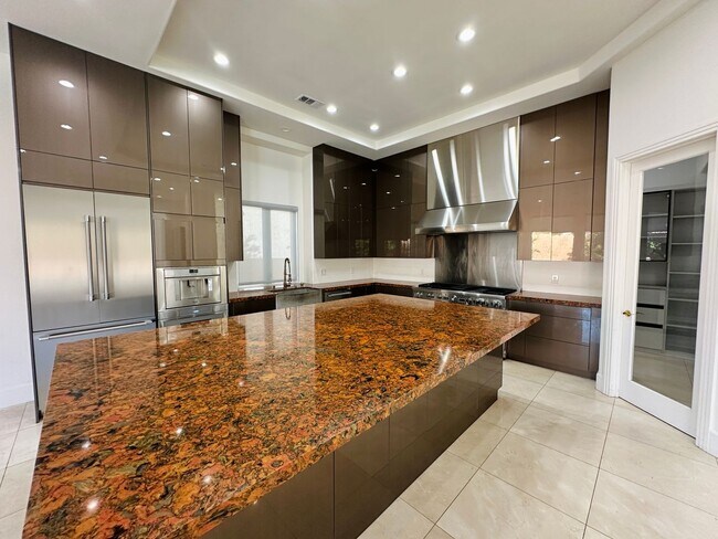 Building Photo - Stunning home with pool in prestigious Eagle Hills!