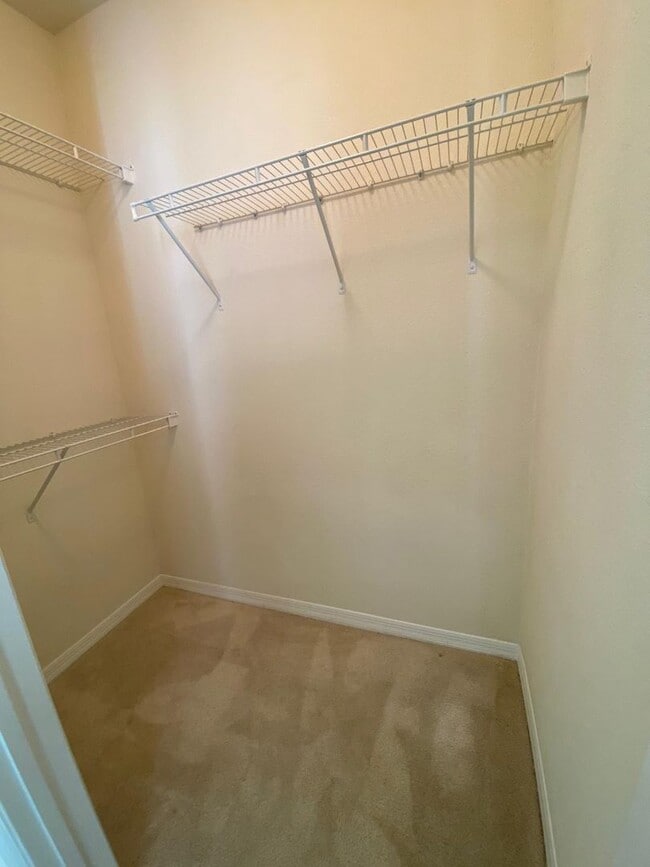 Building Photo - Spacious 2BR/2BA First-Floor Condo with Garage