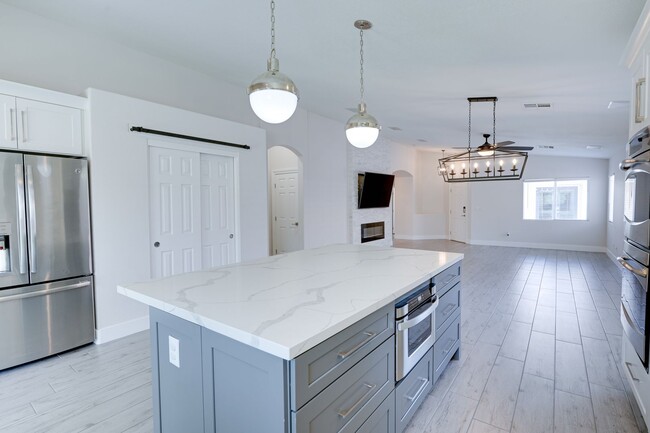 Building Photo - Comfort and Style in a Secure Gated Community: Stylish 4-Bedroom Single-Story Home