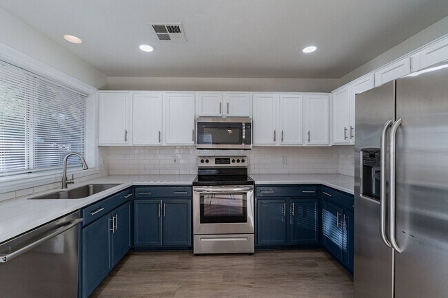 Building Photo - Spacious 5-Bedroom Home with Open Layout & Private Backyard