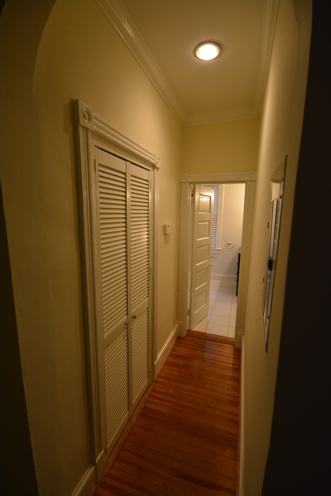Small Hallway to Bathroom (Laundry behind Louvered Doors) - 7104 Maple Ave