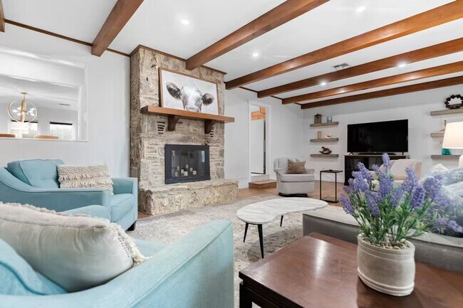 Building Photo - 3 Bed, 3 Bath Home with Expansive Kitchen, Two Living Areas & Private Suite