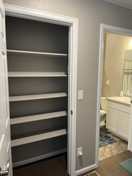 Main Level Bathroom Closet - 19909 E 61st Dr