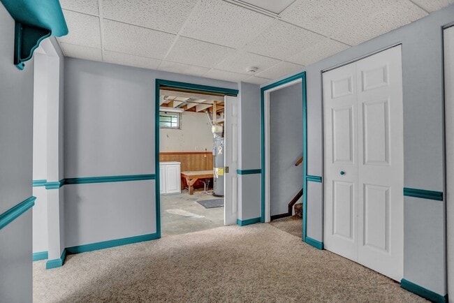 Building Photo - Spacious 4-Level Home with Deck, Workshop ...