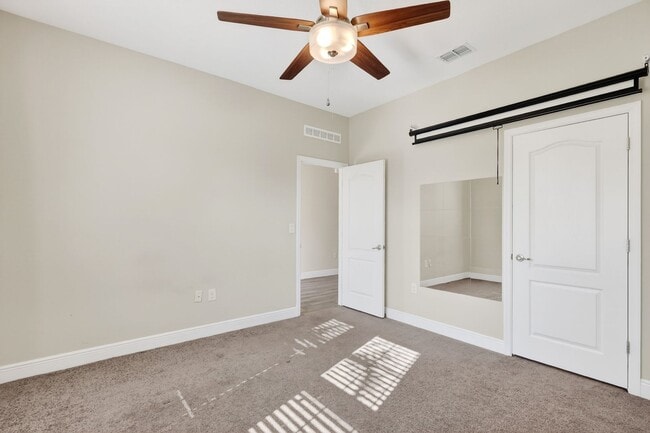 Building Photo - Modern 4-Bedroom Rental with Screened Patio & 2-Car Garage