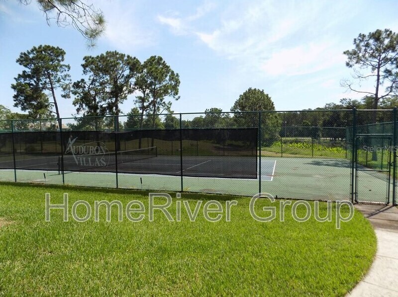 Building Photo - 13929 Fairway Island Dr