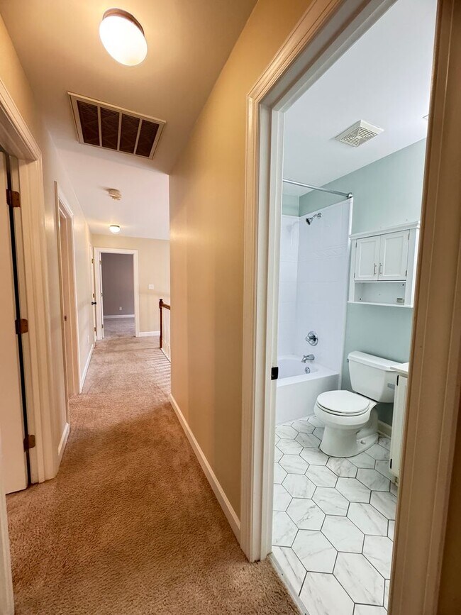 Building Photo - Spacious 4BR 2.5BA Home in Adams Farm with...