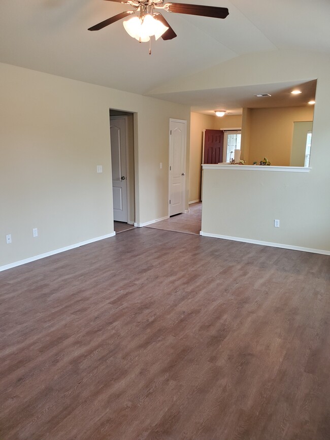 Living room seen from back door, view into hallways - 16021 S 83rd East Ave