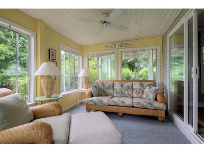 3 season sunroom is the perfect place to enjoy your morning coffee & leads out to the private deck - 8 Myrica Ave